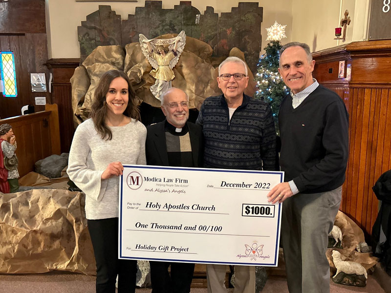 Modica check presentation to Alyssa's Angels